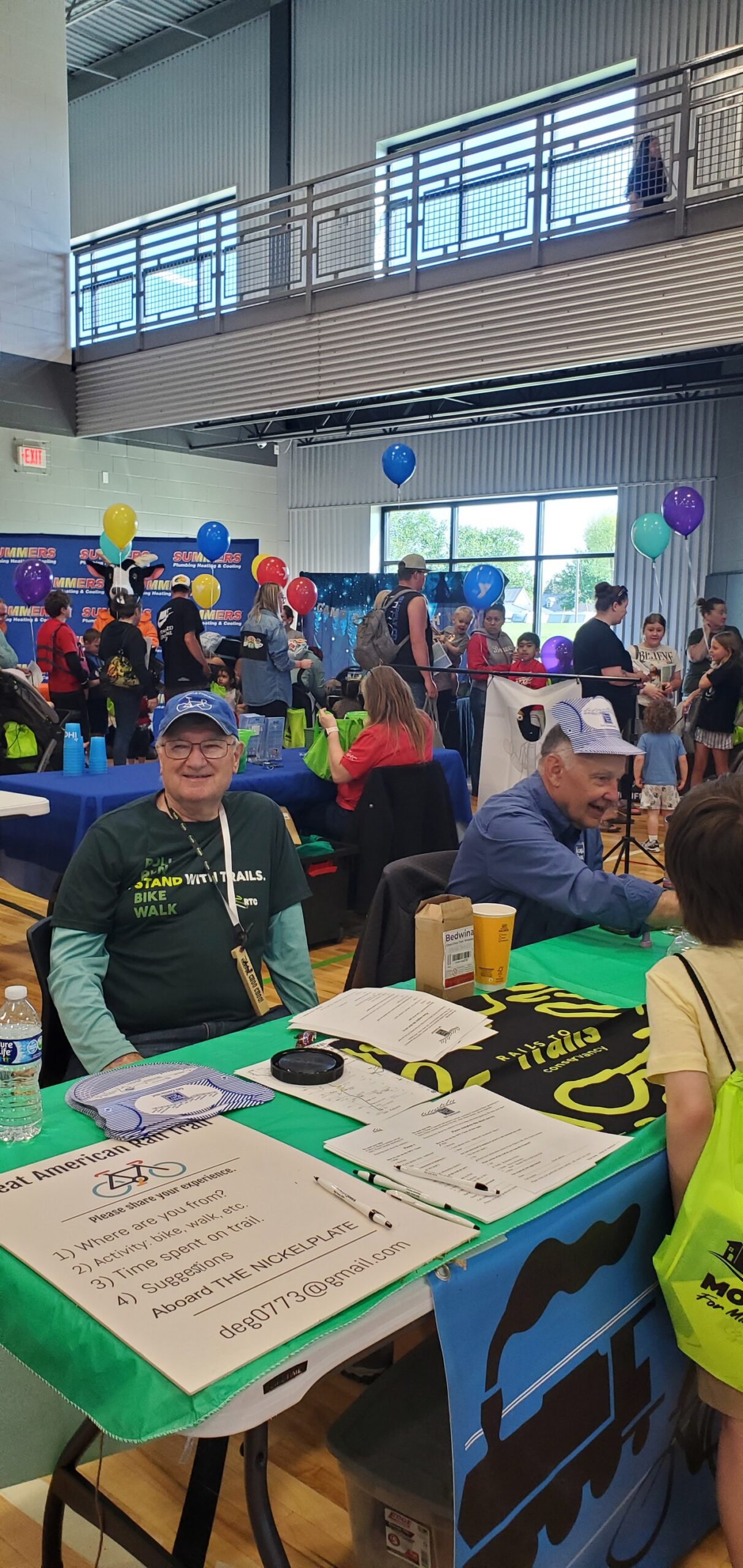 NPT volunteers at the Great American Rail-Trail table at the Miami County YMCA Kids Fair