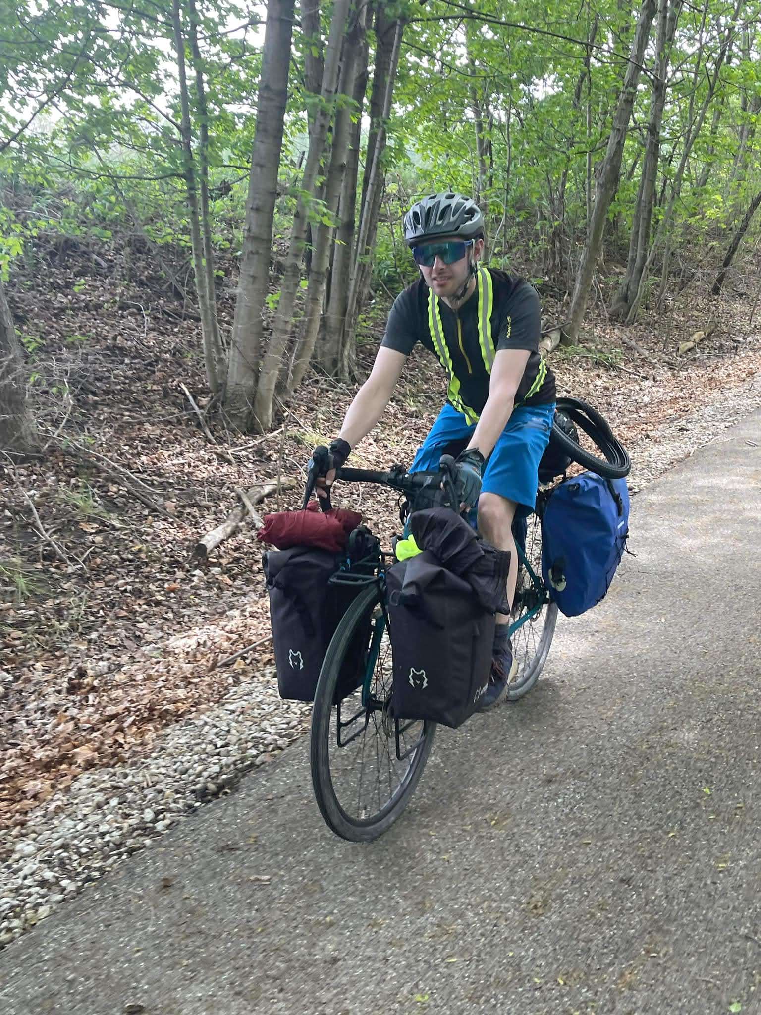 Loaded touring cyclist on the trail