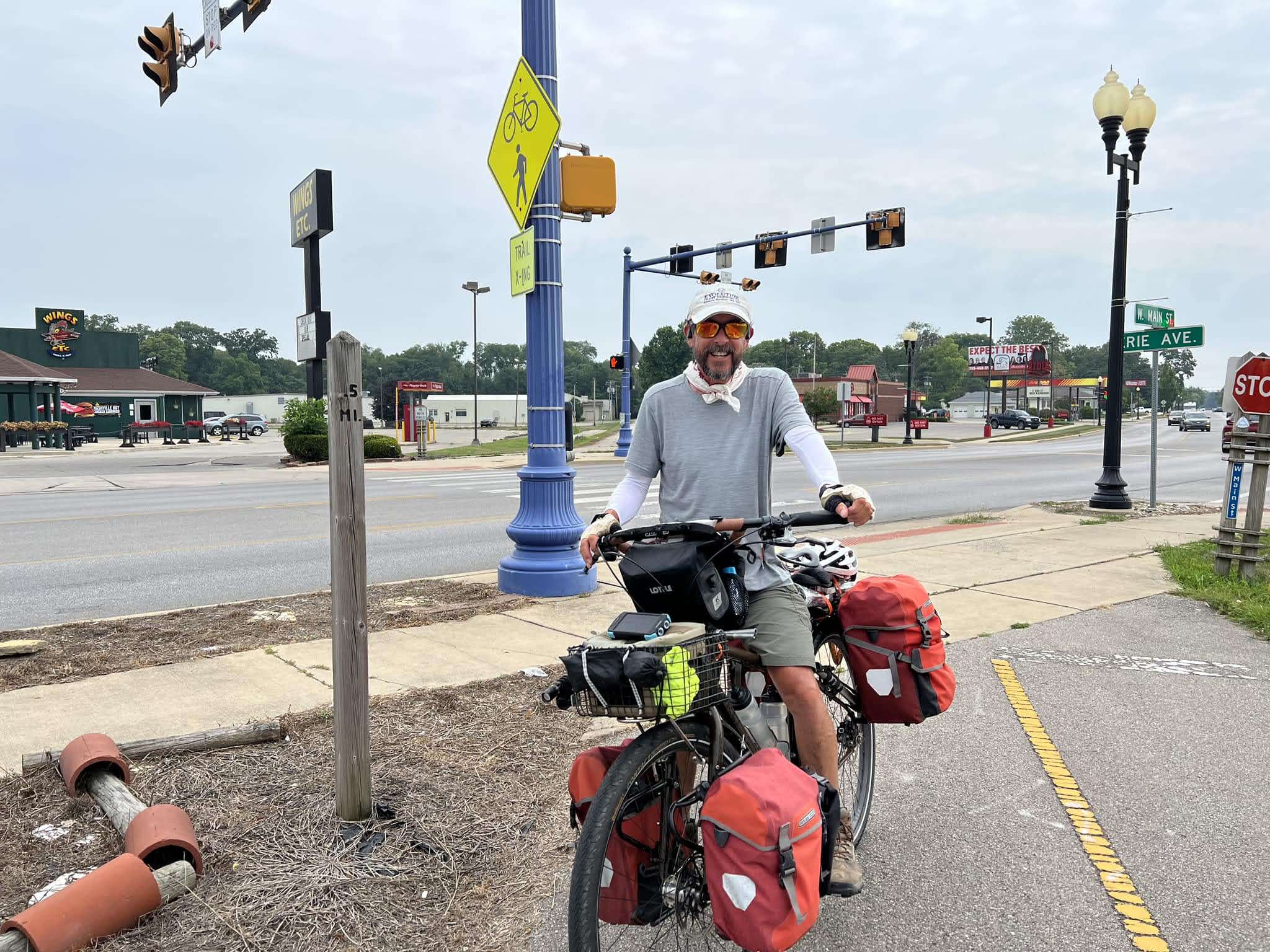 Cyclist with panniers on the Nickel Plate Trail