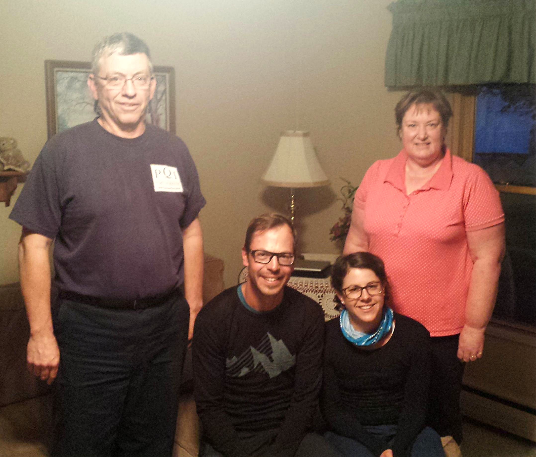 Tim and Terry Finster with Martin and Beatrice in their living room