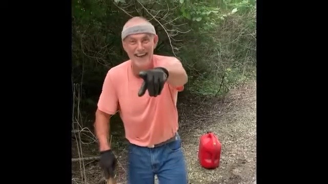Ron Mofield smiling and pointing on the Nickel Plate Trail